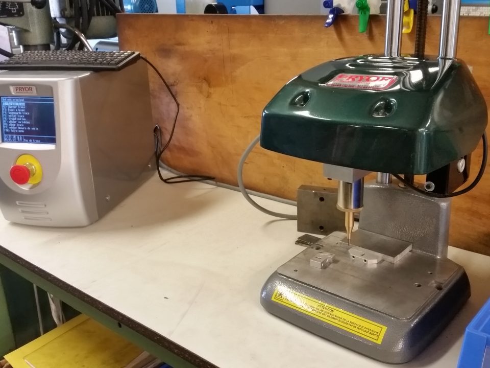 distribution-orientation machine à graver